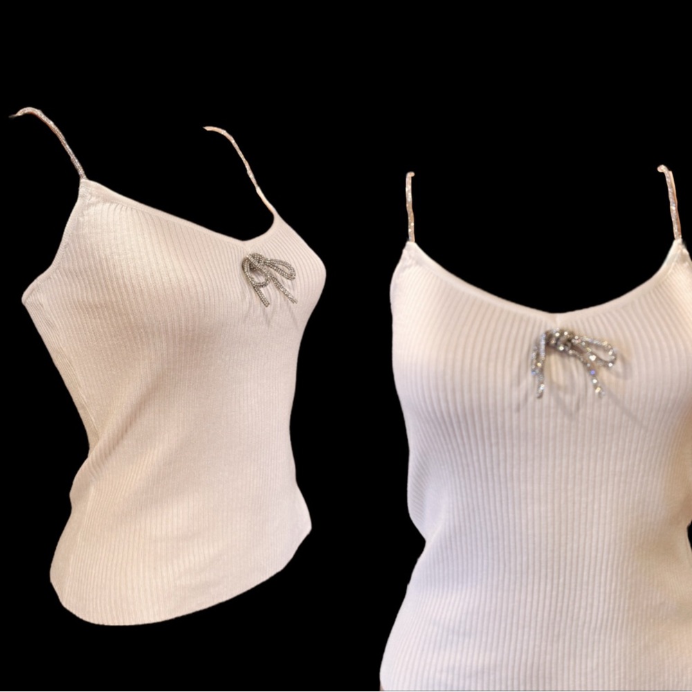 Very sparkly! Photos do not do it justice! Forever 21 white rhinestone top